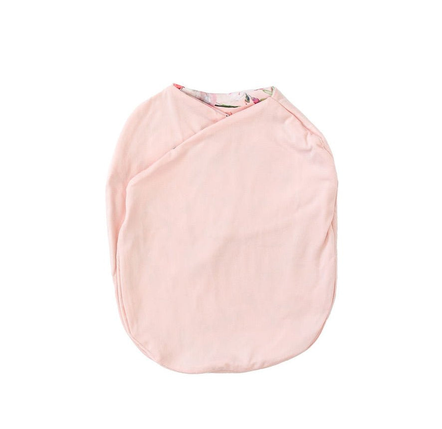 Baby cocoon swaddle blanket made with smooth Silky Modal in Peachy Rose Fields design.