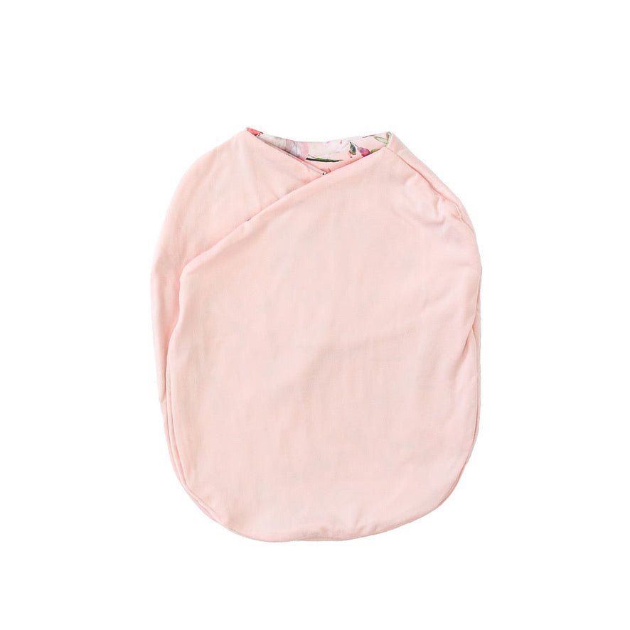 Baby cocoon swaddle blanket made with smooth Silky Modal in Peachy Rose Fields design.