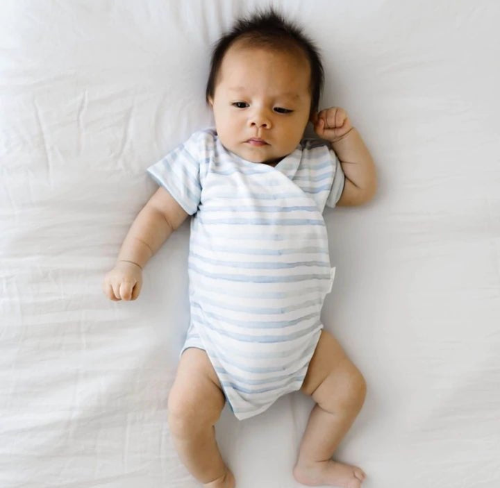 Reversible short-sleeve onesie outfit bundle in chambray waves design.