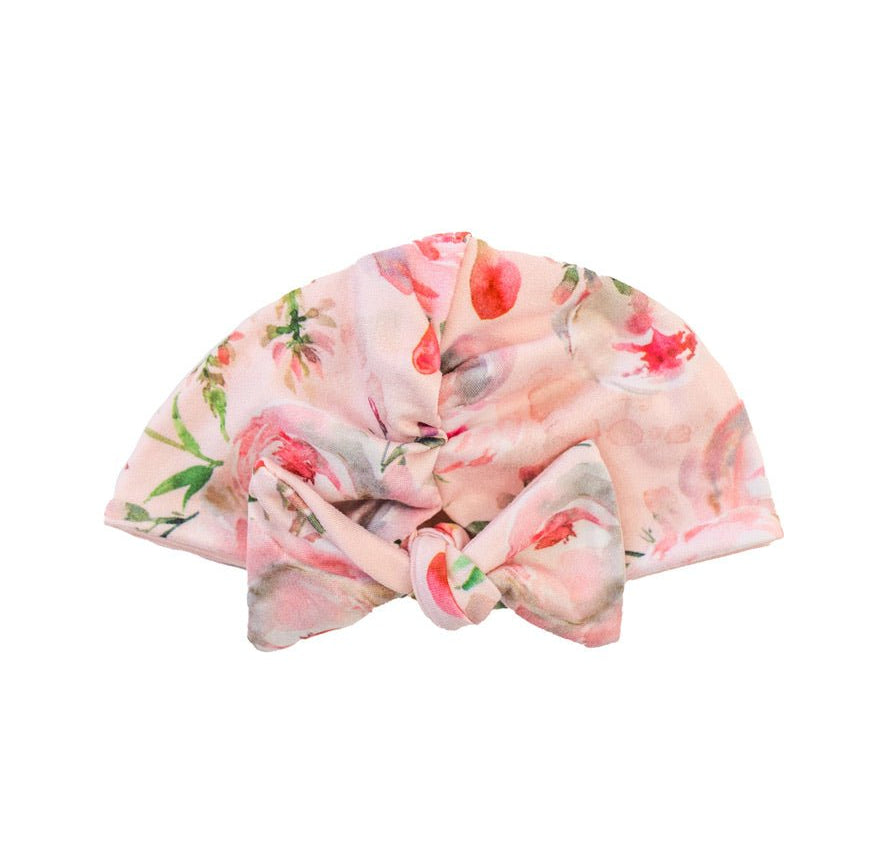 Adorable ruched beanie with bow for babies in Peachy Rose Fields with a soft stretchy fit.
