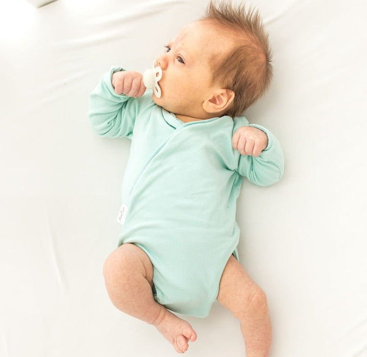 Honeydew Palms design winged bodysuit for babies in classic brushed fabric.