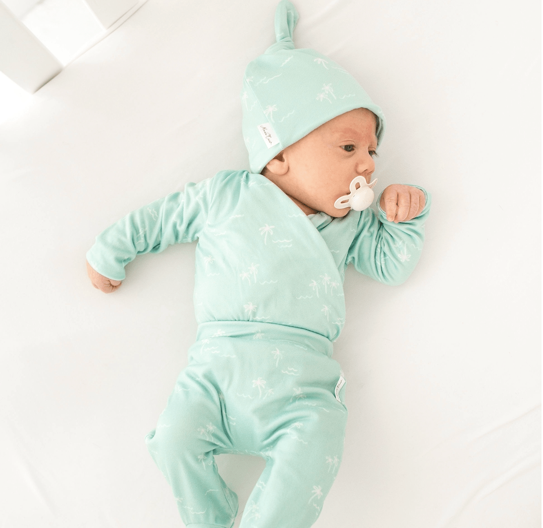Cozy reversible baby beanie in Honeydew Palms with a gentle classic brushed fabric feel.