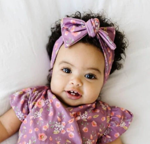 Headwrap with bow in Peachy Lilac design, made from classic brushed fabric.