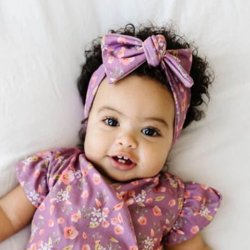 Headwrap with bow in Peachy Lilac design, made from classic brushed fabric.