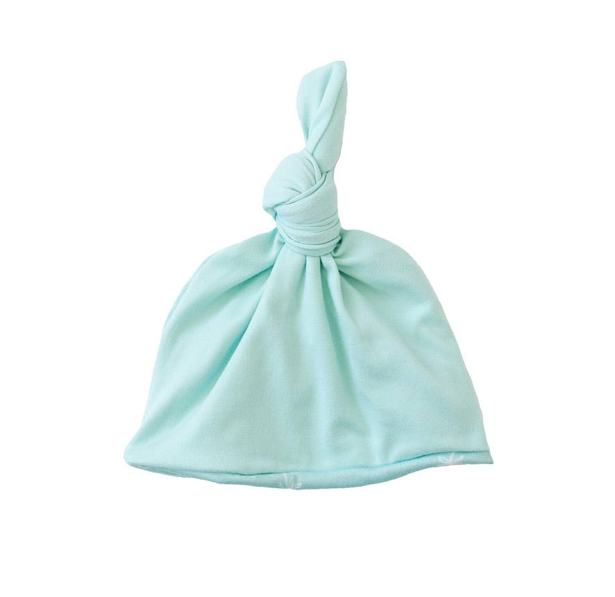 Soft classic brushed fabric gives this reversible Honeydew Palms baby beanie a cozy feel.