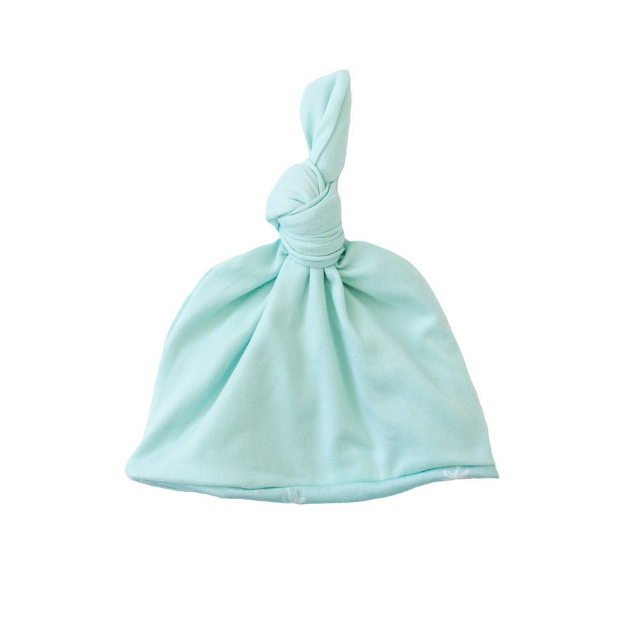 Soft classic brushed fabric gives this reversible Honeydew Palms baby beanie a cozy feel.
