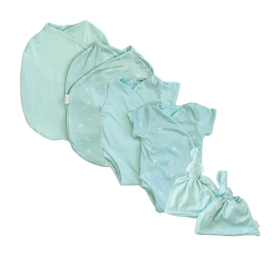 Newborn essentials bundle with short sleeves in classic brushed fabric with honeydew palms design.