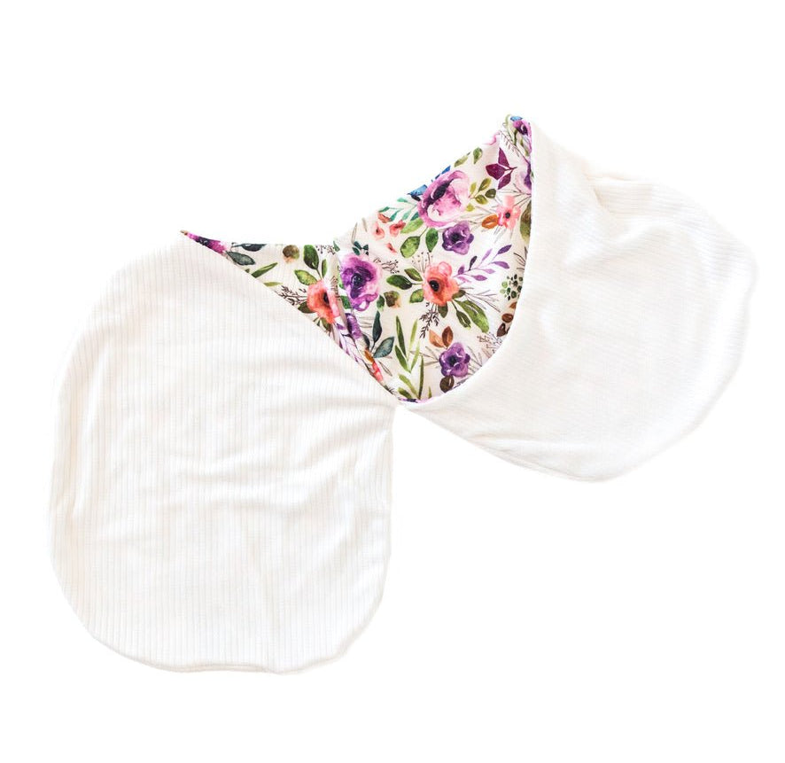 Silky Modal newborn baby cocoon swaddle with sweet Ivory Wildflowers pattern.