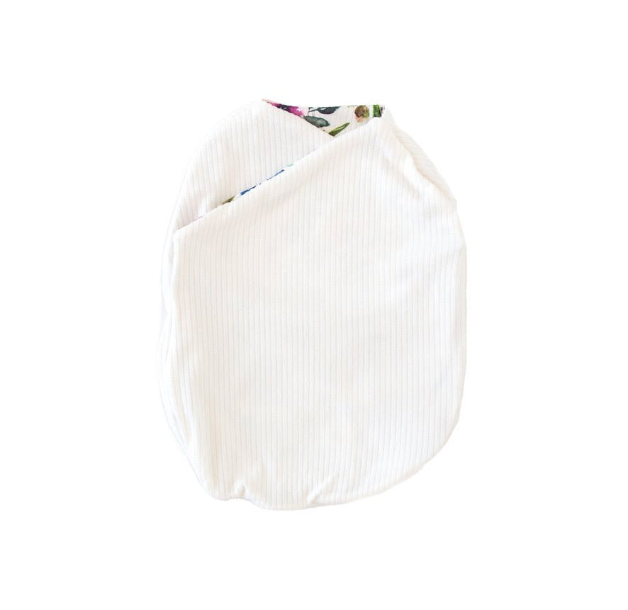 Cozy Silky Modal Ivory Wildflowers baby cocoon swaddle for infants.