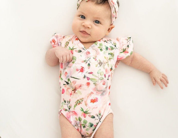 Classic brushed flutter sleeve newborn essentials bundle in peachy rose fields design.