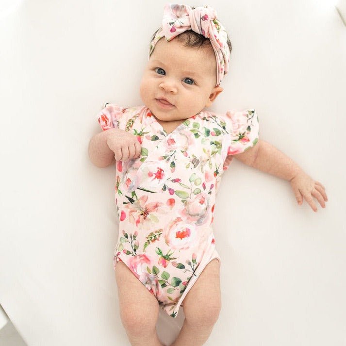 Classic brushed flutter sleeve newborn essentials bundle in peachy rose fields design.