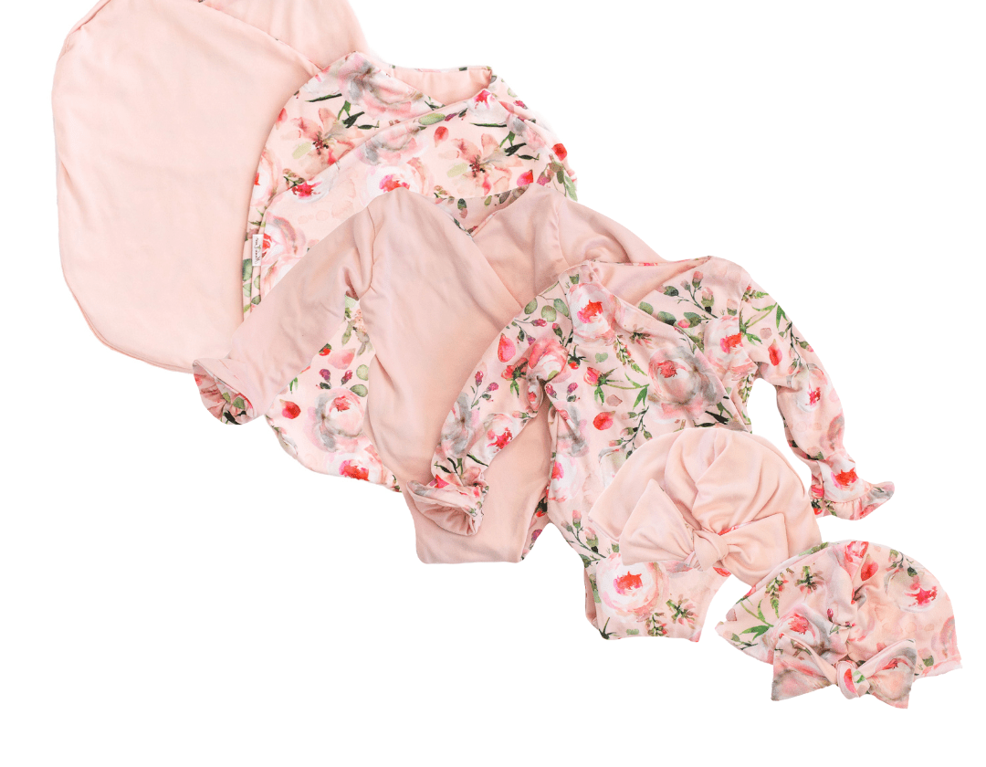 Classic brushed long sleeve newborn baby bundle, featuring adorable ruffle cuffs in peachy rose fields design.