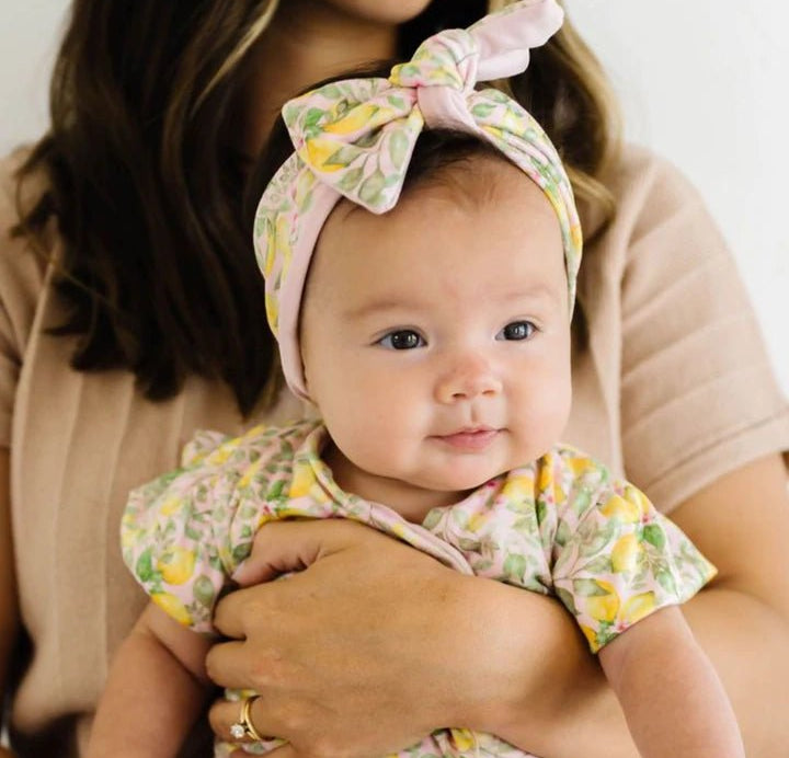 Cozy Pink Lemonade headwrap accented with a beautiful bow.