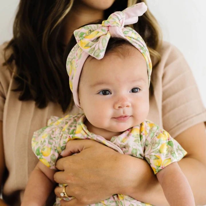 Cozy Pink Lemonade headwrap accented with a beautiful bow.