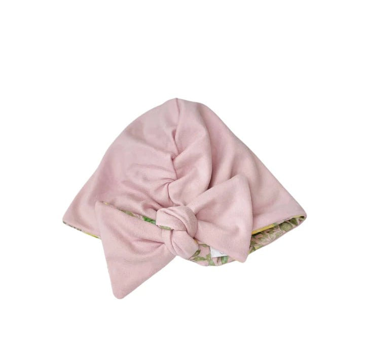 Reversible soft ruched baby beanie with bow made from classic brushed fabric in our Pink Lemonade design.