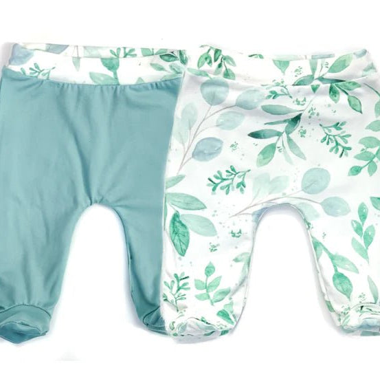 Reversible footie pants in saged eucalyptus design.