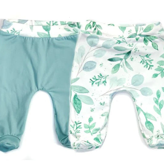 Reversible footie pants in saged eucalyptus design.