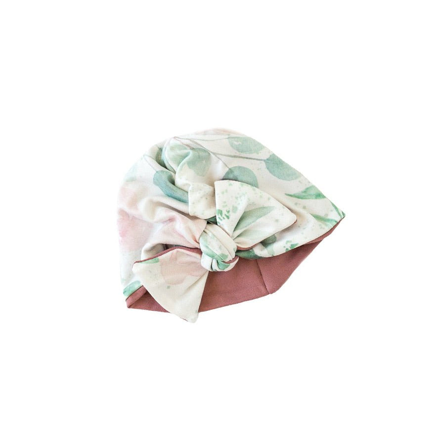 Reversible classic brushed baby beanie in blushing eucalyptus design.