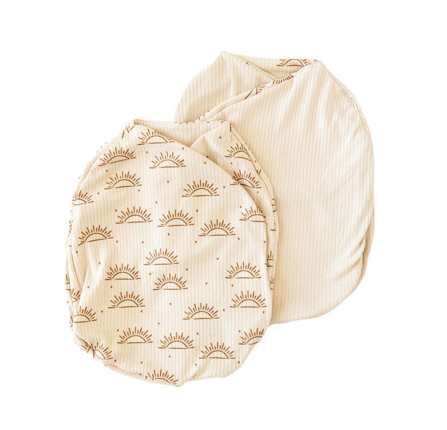 Reversible Sandy Sunsets design baby cocoon swaddle.