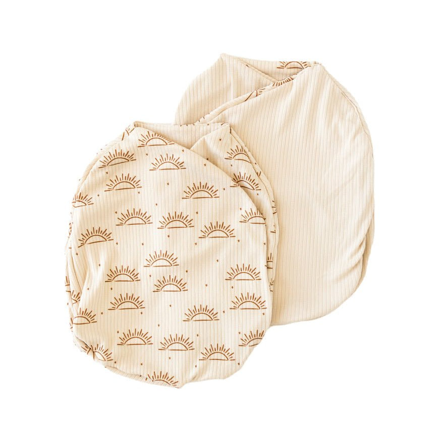 Reversible Sandy Sunsets design baby cocoon swaddle.