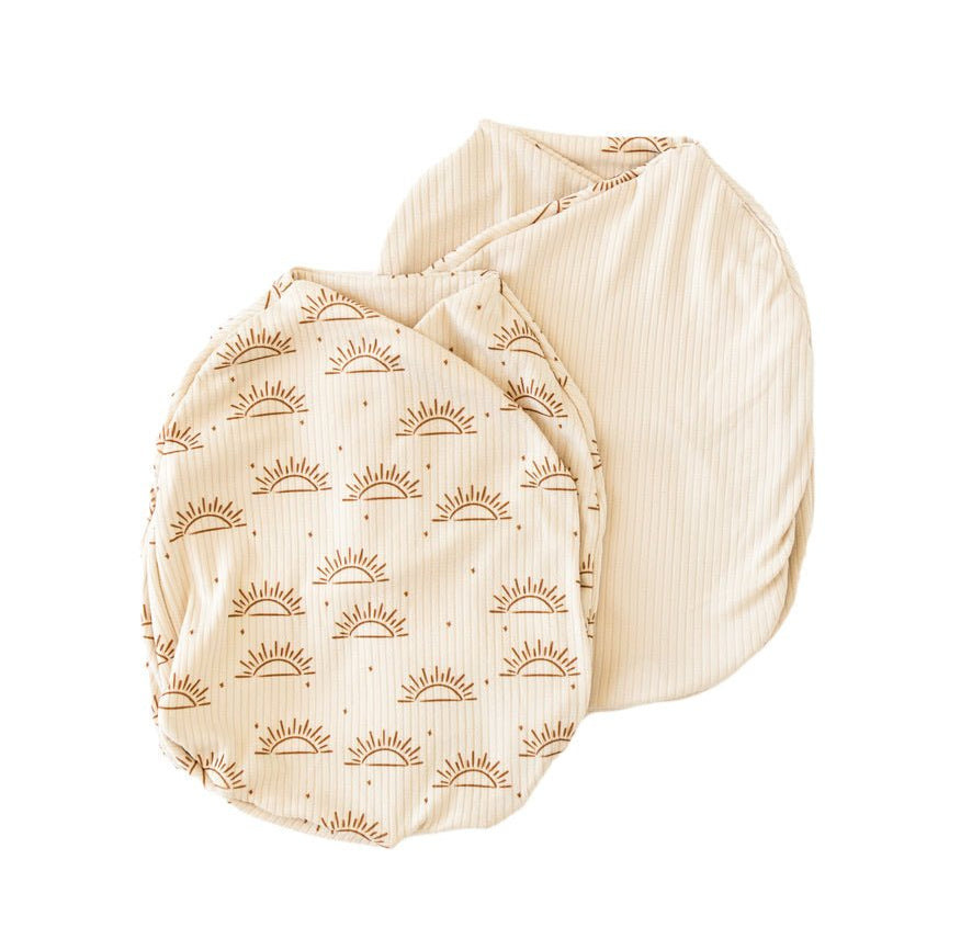 Reversible Sandy Sunsets design baby cocoon swaddle.