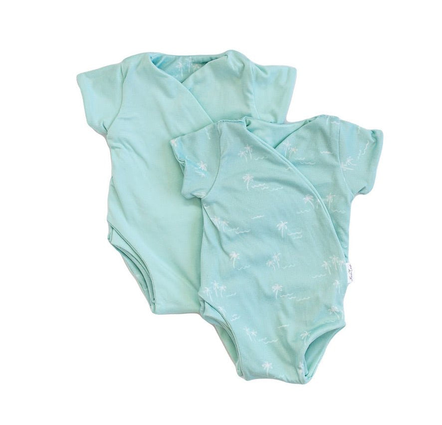 Soft classic brushed reversible short-sleeve winged bodysuit in the Honeydew Palms design for comfortable everyday wear.