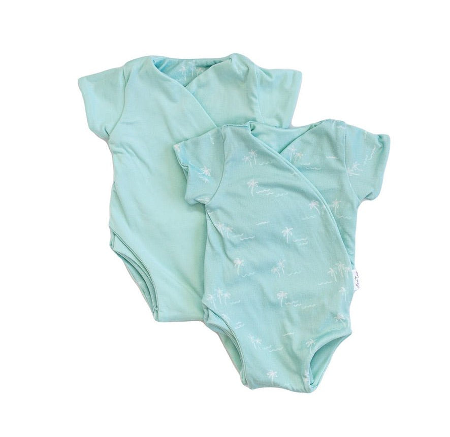 Soft classic brushed reversible short-sleeve winged bodysuit in the Honeydew Palms design for comfortable everyday wear.