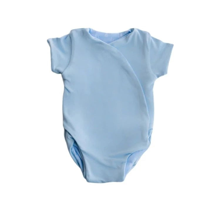 Soft classic brushed reversible short-sleeve winged bodysuit in the Sailboat Shores design for comfortable everyday wear.