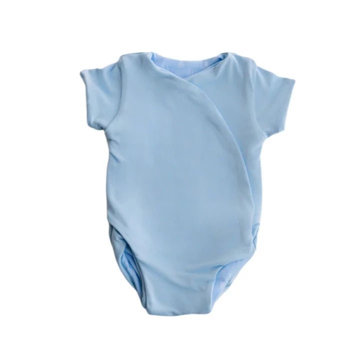 Soft classic brushed reversible short-sleeve winged bodysuit in the Sailboat Shores design for comfortable everyday wear.
