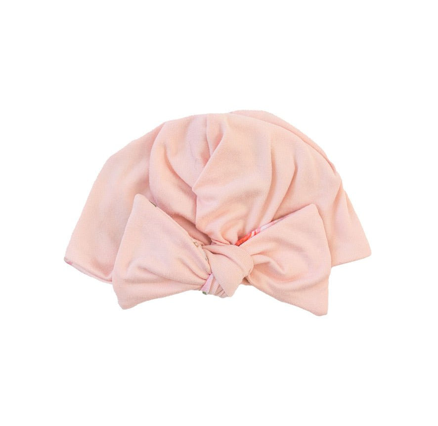 Soft reversible Peachy Rose Fields classic brushed ruched baby beanie with bow for a sweet everyday outfit.