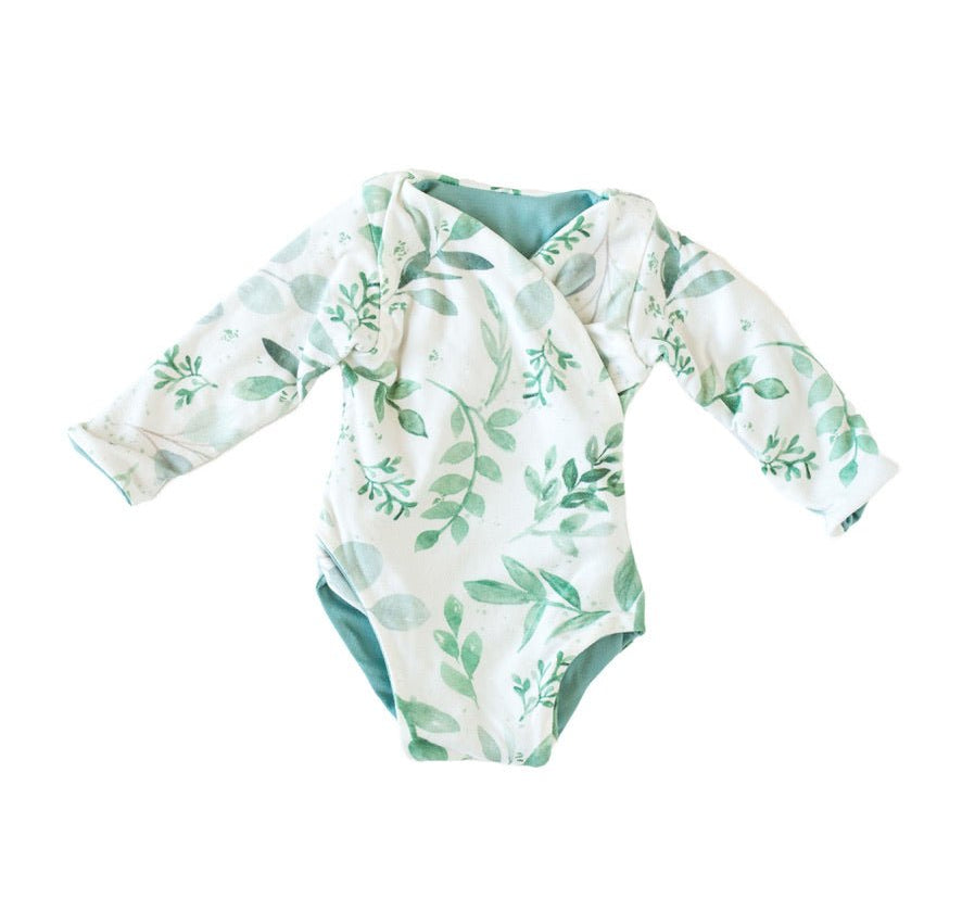 Long-sleeved winged bodysuit for babies in classic brushed fabric.