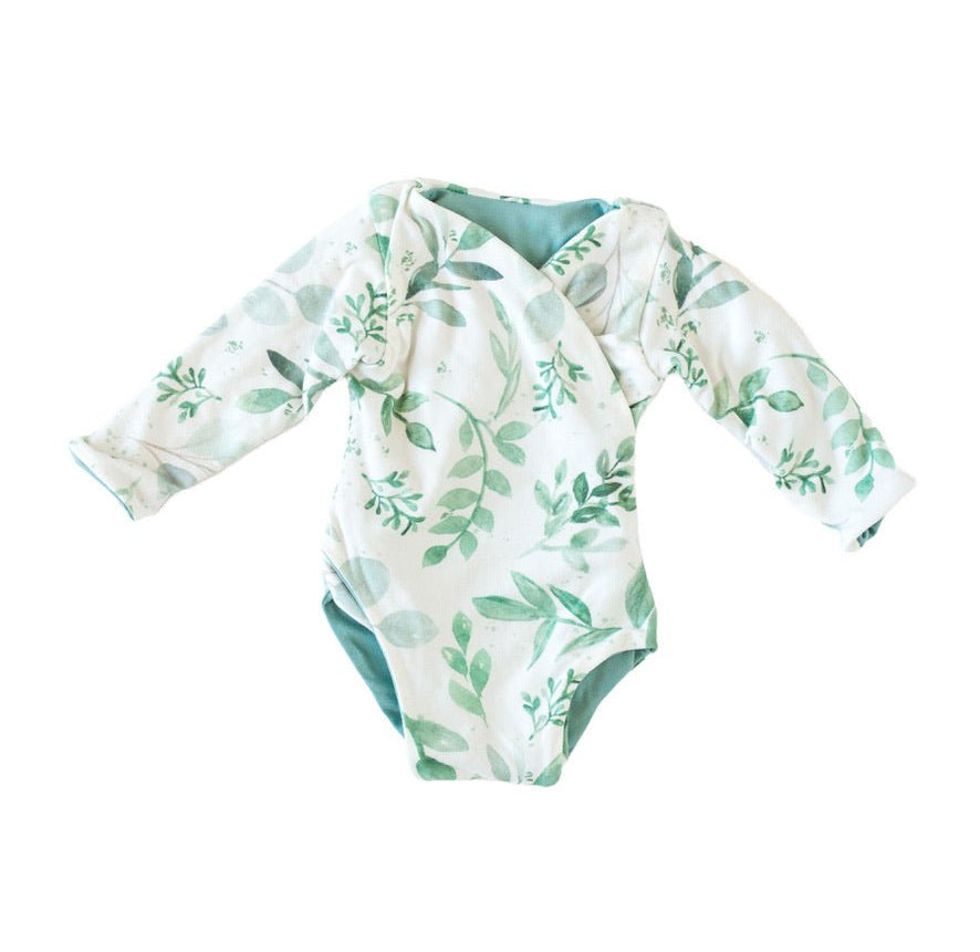 Long sleeved winged bodysuit for babies in classic brushed fabric.
