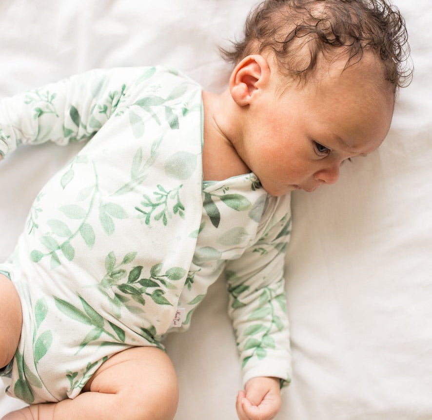 Saged Eucalyptus design baby winged bodysuit in classic brushed fabric.