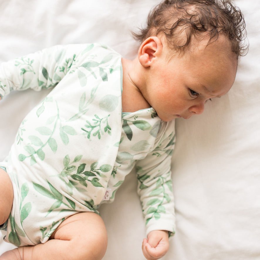 Saged Eucalyptus design baby winged bodysuit in classic brushed fabric.