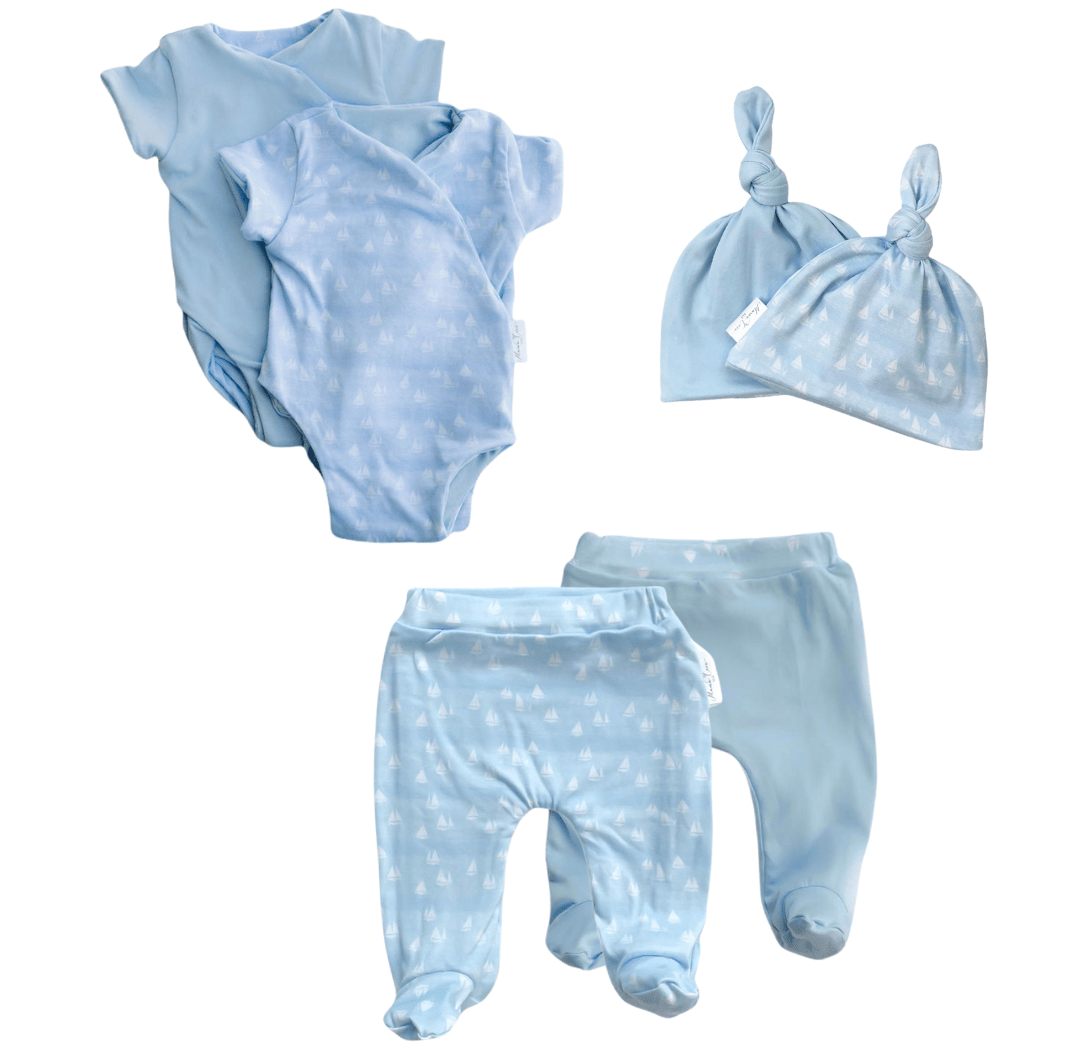 Reversible short-sleeve onesie outfit bundle in sailboat shores design.