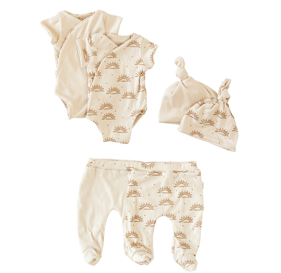 Short-sleeve onesie outfit bundle in sandy sunsets design.