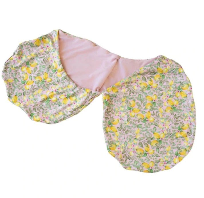 Soft baby cocoon swaddle made from Silky Modal in the Pink Lemonade design.