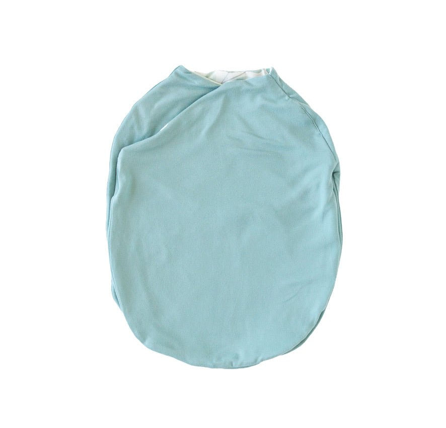 Reversible baby cocoon swaddle blanket made with smooth Silky Modal in Saged Eucalyptus design.