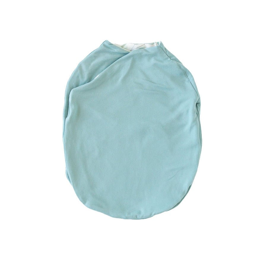 Reversible baby cocoon swaddle blanket made with smooth Silky Modal in Saged Eucalyptus design.
