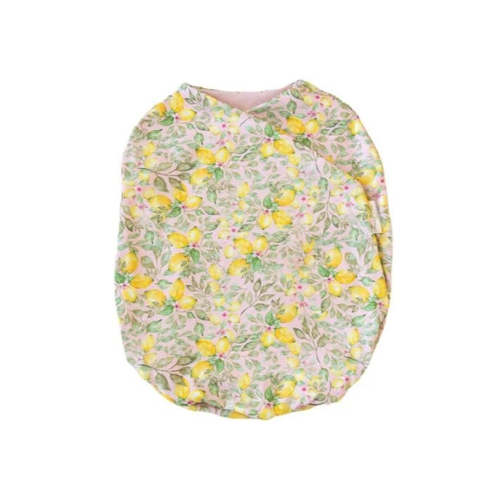 Silky Modal baby cocoon swaddle in Pink Lemonade for newborn comfort.