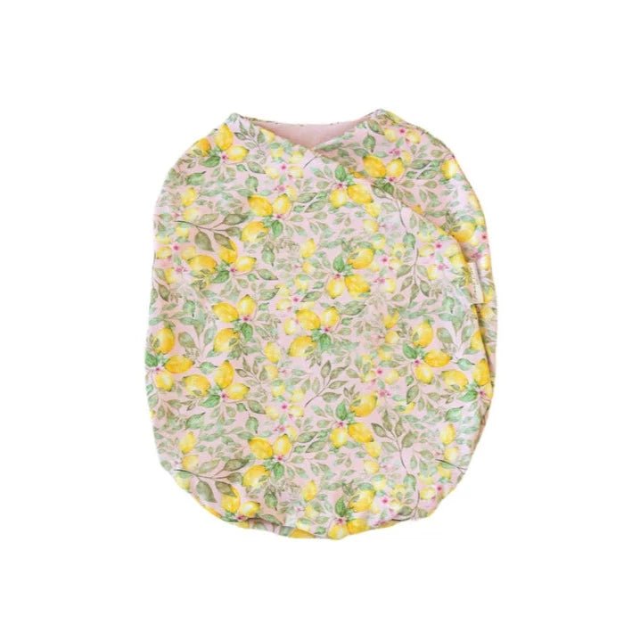 Silky Modal baby cocoon swaddle in Pink Lemonade for newborn comfort.