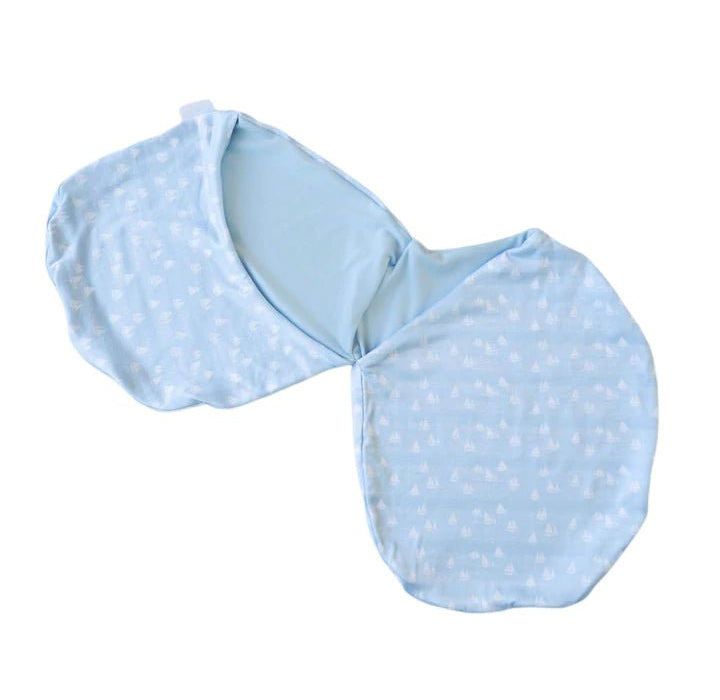 Silky Modal baby cocoon swaddle in Sailboat Shores for newborn comfort.