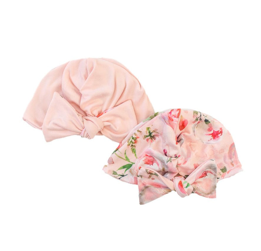 Cozy ruched beanie with bow for babies featuring the gentle Peachy Rose Fields print.