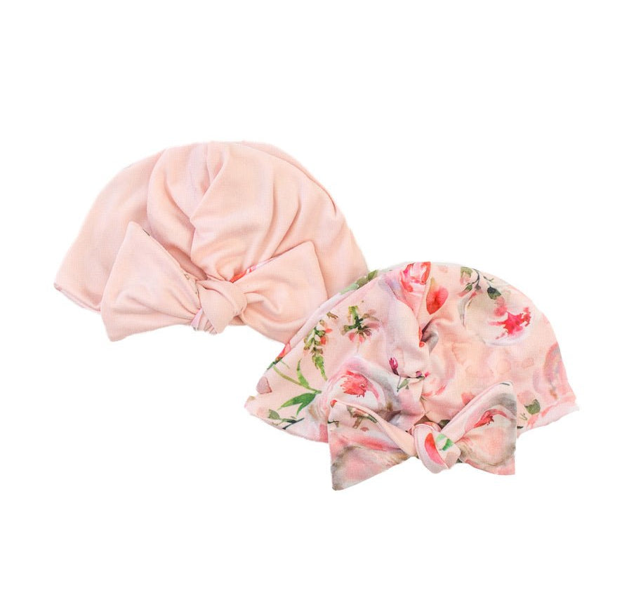 Cozy ruched beanie with bow for babies featuring the gentle Peachy Rose Fields print.