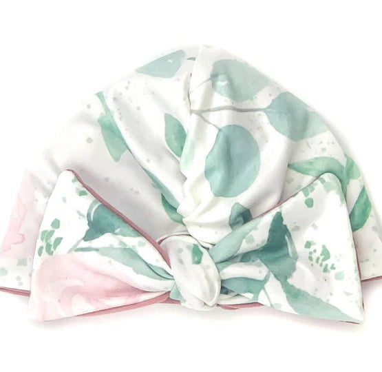 Comfortable Blushing Eucalyptus ruched baby beanie with bow crafted from classic brushed baby fabric.