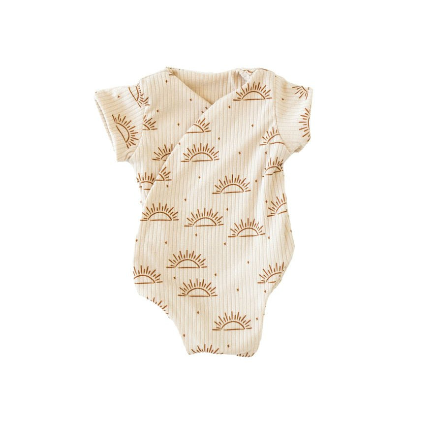 Sandy Sunsets short-sleeve winged bodysuit made from classic brushed fabric for a gentle fit.