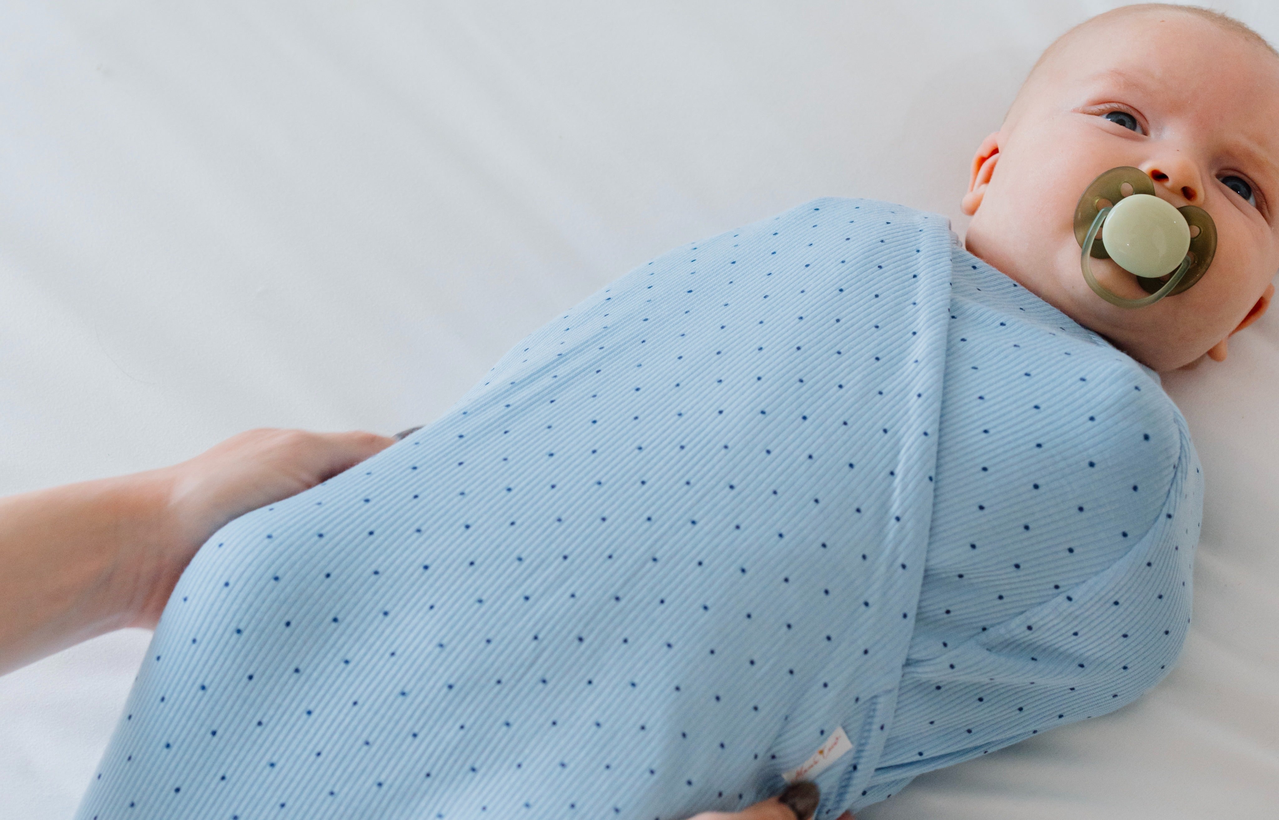 How to Choose the Right Swaddle for Your Newborn’s Sleep Style