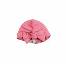 Reversible classic brushed fabric makes this Flower Power ruched baby beanie with bow soft for everyday wear.
