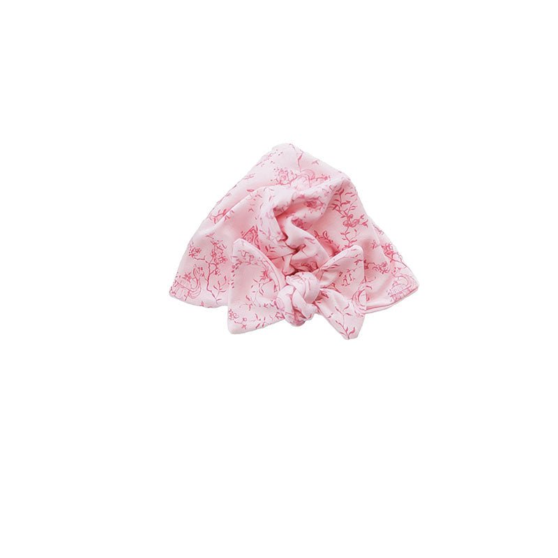 Bamboo cotton baby beanie with ruched bow in whimsical garden design.