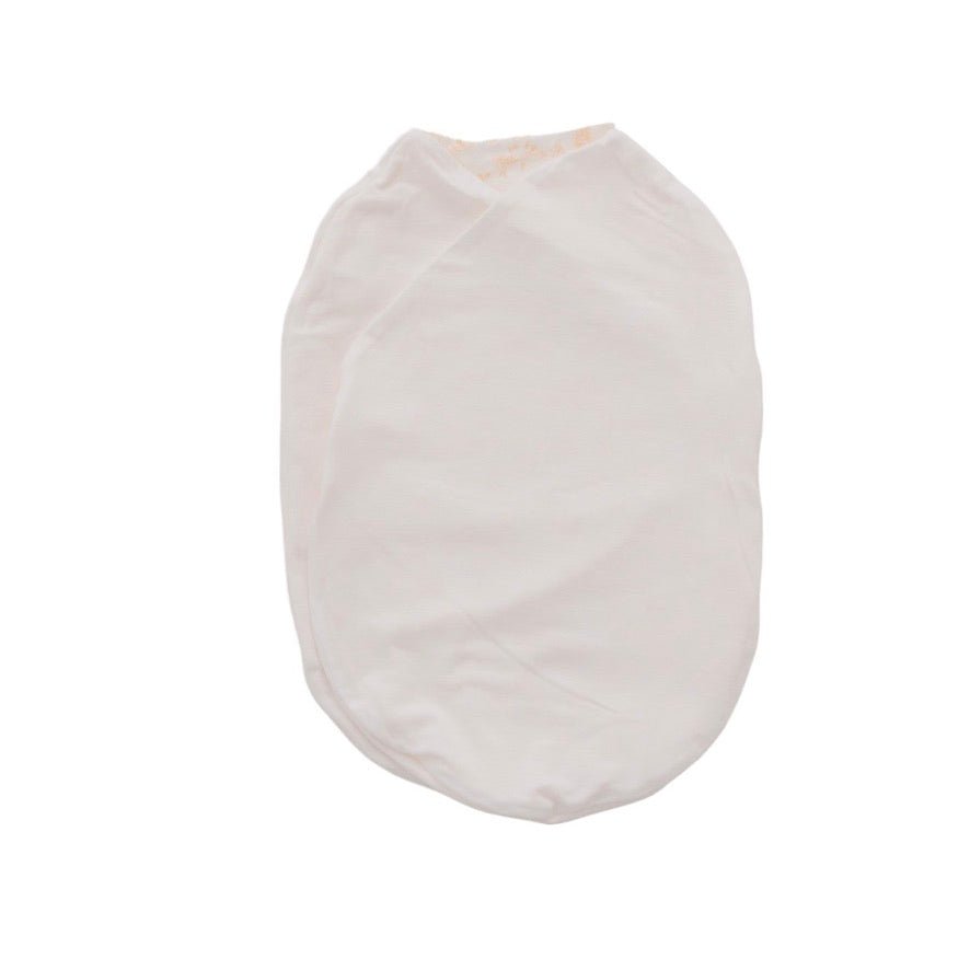 Newborn swaddle comfort enhanced by the Bitty Blooms pattern in Silky Modal fabric.